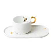 Tasse mit Servierplatte "Schneetag" (Weiß/Gold) räder Design