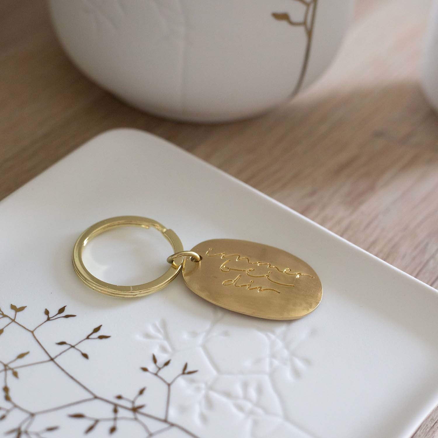 Schlüsselanhänger "GOLDSTEIN - Glücksbringer" - 5,5x2,3x0,4cm (Gold) räder Design