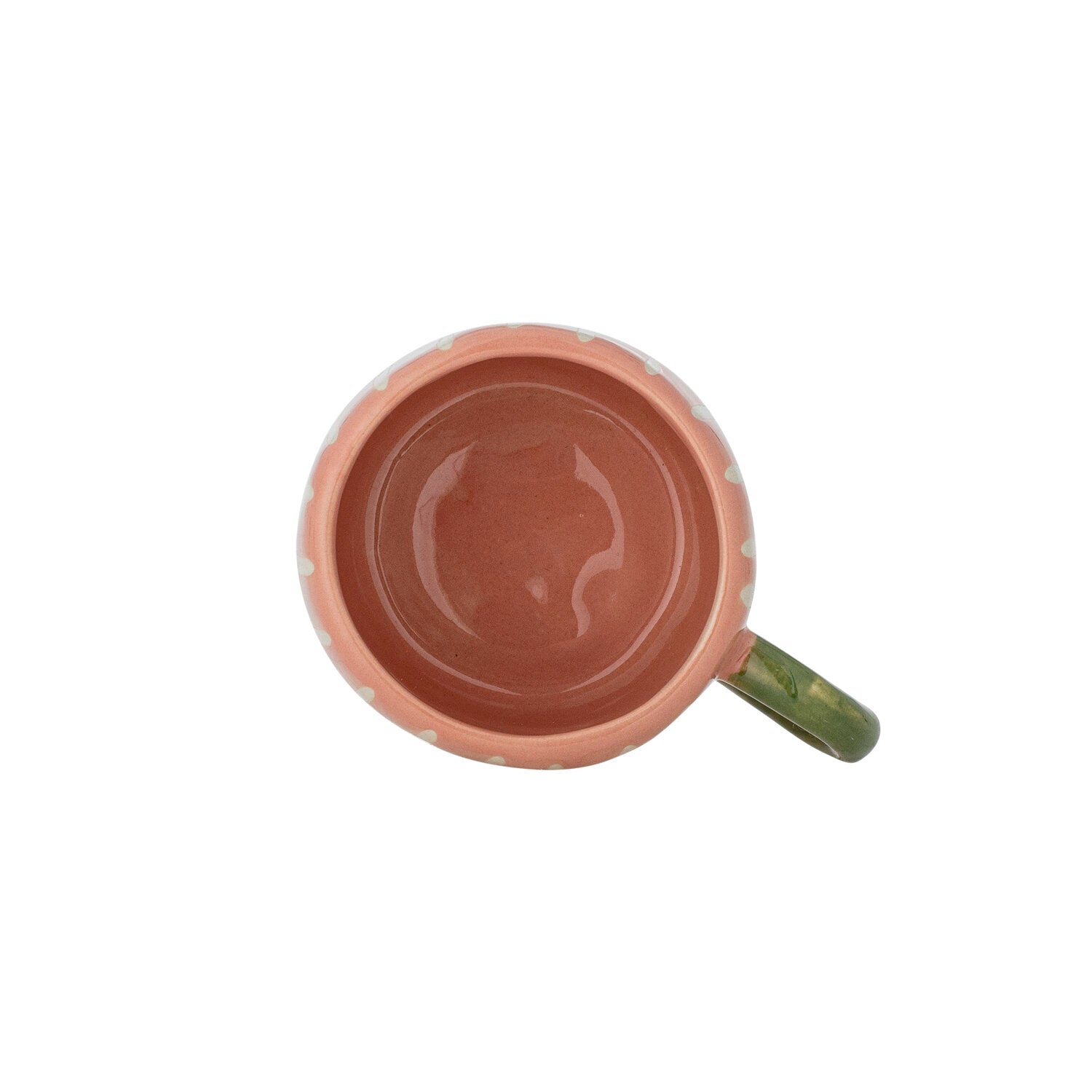Innenansicht der rosa Tasse: braune Innenseite, weißer Rand, grüner Henkel