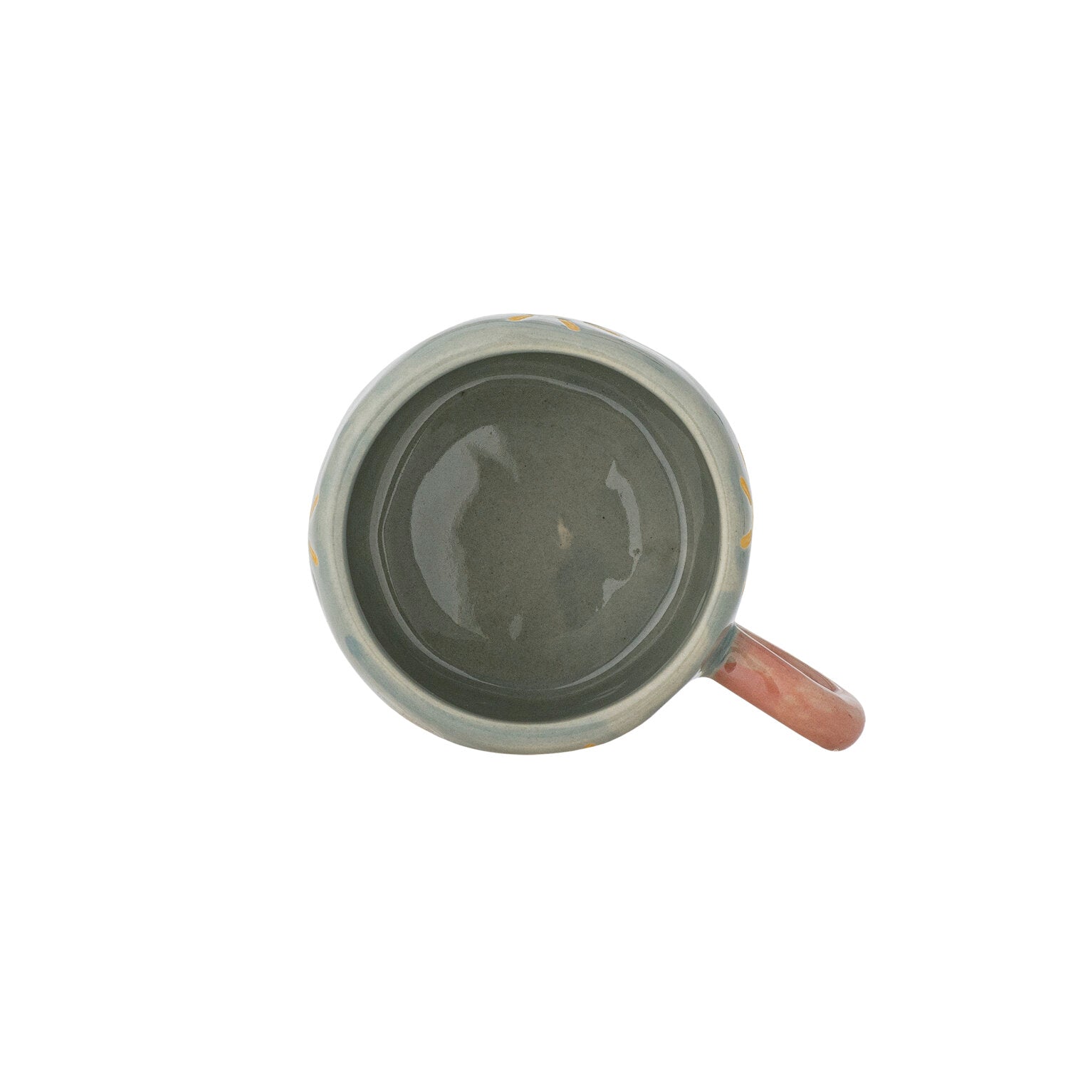Grau-blaue Tasse von unten mit dunklem Innenbereich und rosafarbenem Henkel