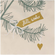 Papierserviette mit Winterzweigen und Schrift „Hello Winter“ auf beigem Untergrund