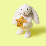 Kuscheltier Hase aus beigem Plüsch mit goldener Stern-Applikation am Vorderarm