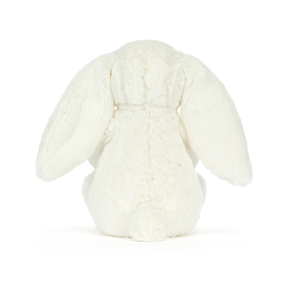 Kuscheltier Hase aus beigem Plüsch mit nach hinten fallenden langen Ohren