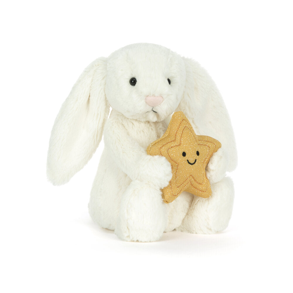 Kuscheltier Hase aus beigem Plüsch mit goldfarbenem Stern im Vorderpfötchen