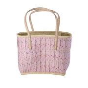 Raffia-Shopper rosafarben mit Blumenmuster, breiten Henkeln und breitem Rand oben