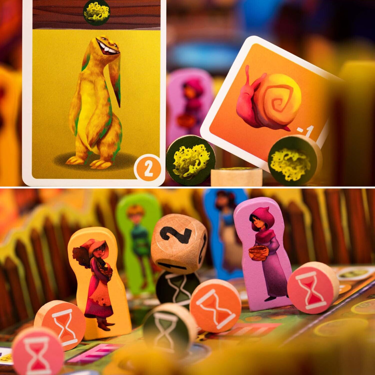 Spielfiguren und Karten auf dem Spielbrett des kooperativen Monster-Brettspiels