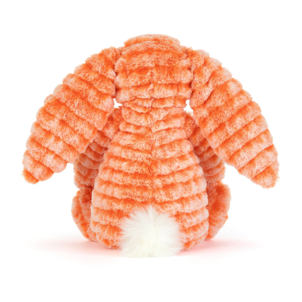 Kuscheltierhase aus orangefarbenem Plüsch, frontal mit abgerundetem Rückenteil.