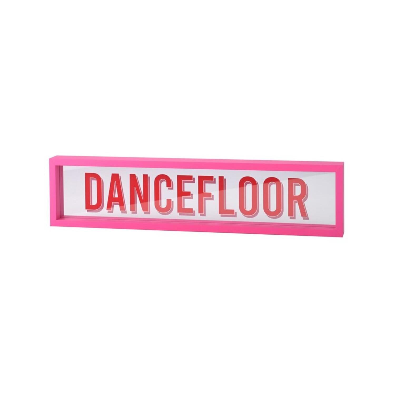 Glasbild mit pinkem Rahmen und Aufdruck „DANCEFLOOR“