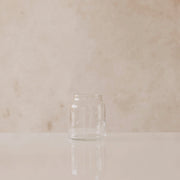 Kleine transparente Glasvase, gedrungene zylindrische Form, kurzer Hals