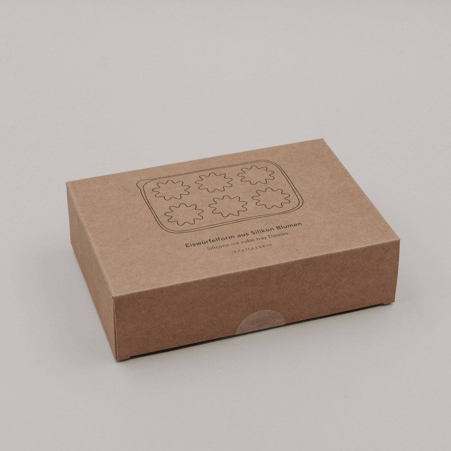Verpackung für Eiswürfelform, brauner Karton mit Kontur einer Blumenform