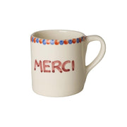 Keramiktasse mit Henkel, Schriftzug „MERCI“, rosa Bordüre am Rand